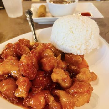 Bamboo House signature dishes Peking Duck, Sui Zu Yu (Boiled Spicy Fish Pot), Crispy Spicy Chicken, Walnut Shrimp. 